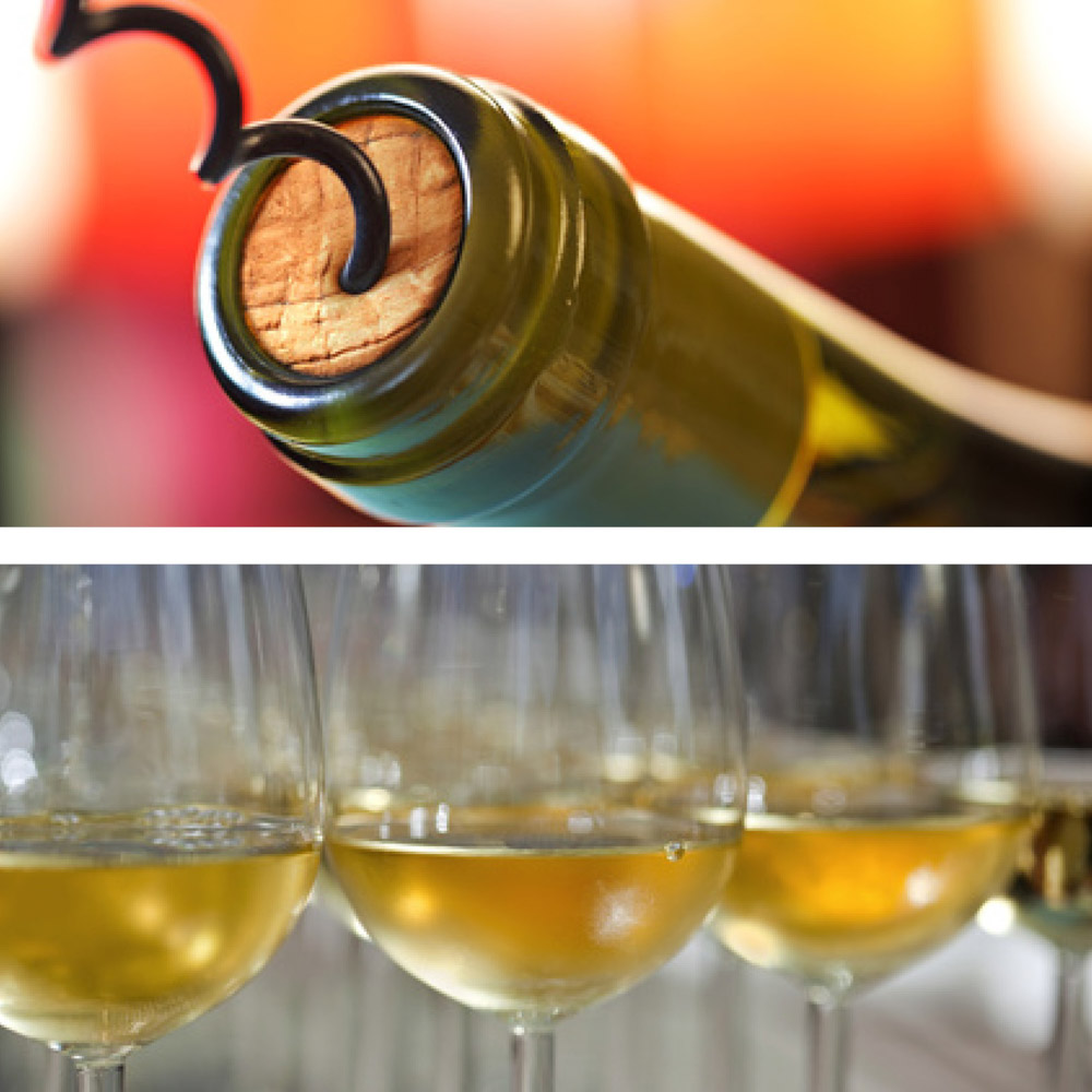 Bouteille de vin et verres de vins blancs lors d'une dégustation œnologique à Vannes